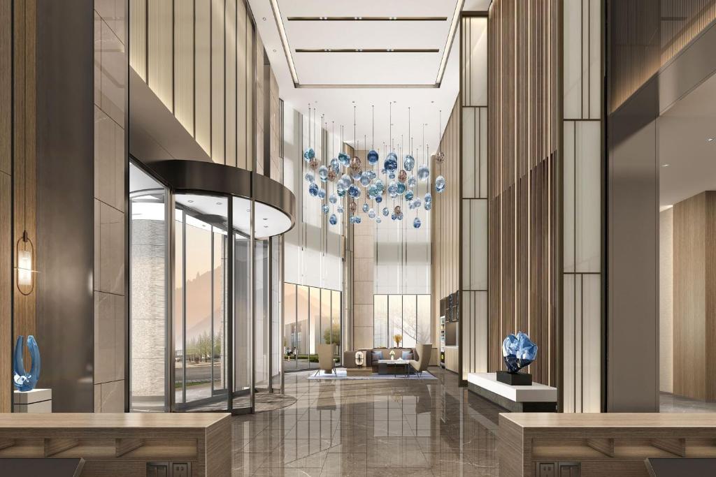 丹阳丹阳万枫酒店的建筑物大厅效果图
