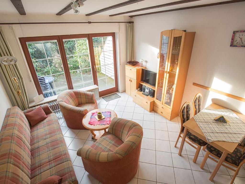 TV a/nebo společenská místnost v ubytování Ferienhaus Hübner, FeWo Vermittlung Nordsee