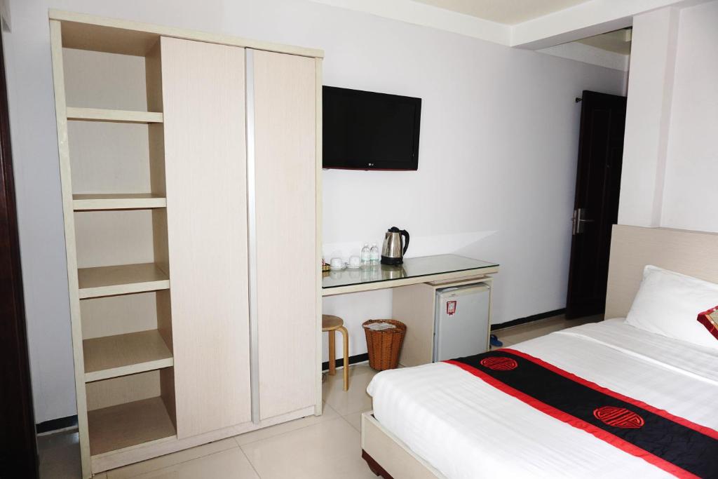 Postel nebo postele na pokoji v ubytování Le Duong Hotel