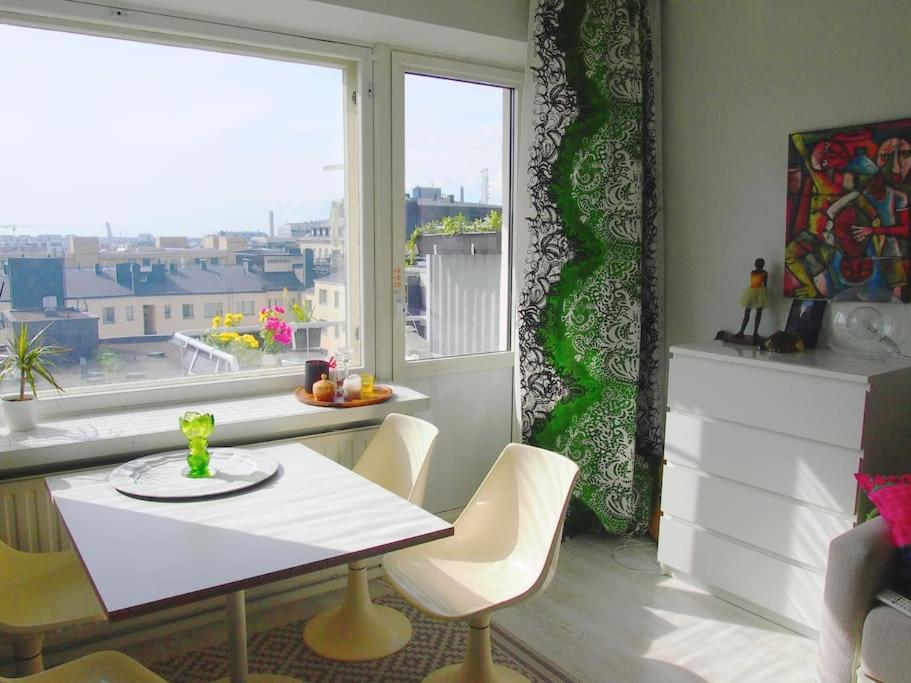 Helsinki Kamppi 7th floor studio apartment with balcony and city view