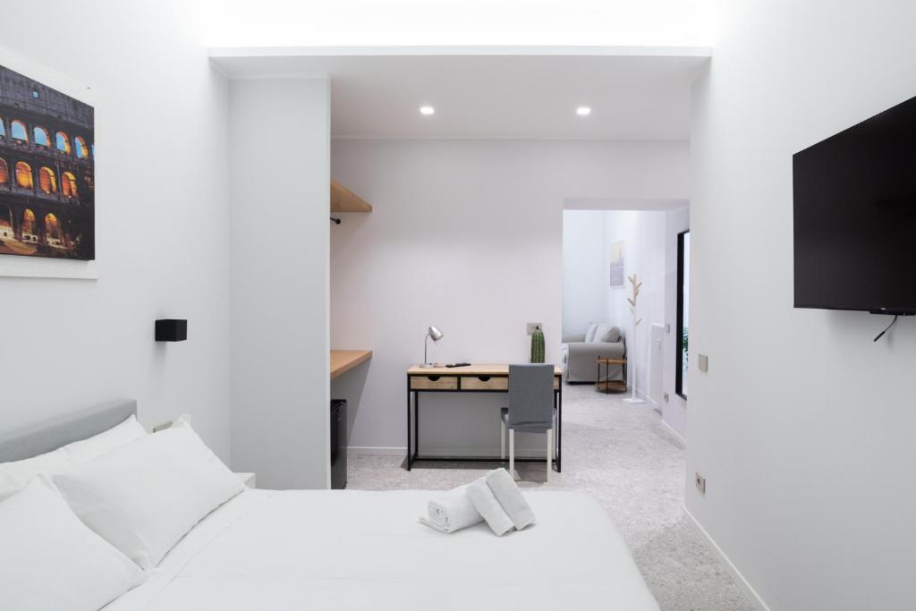 Ліжко або ліжка в номері White Home Suite and Rooms
