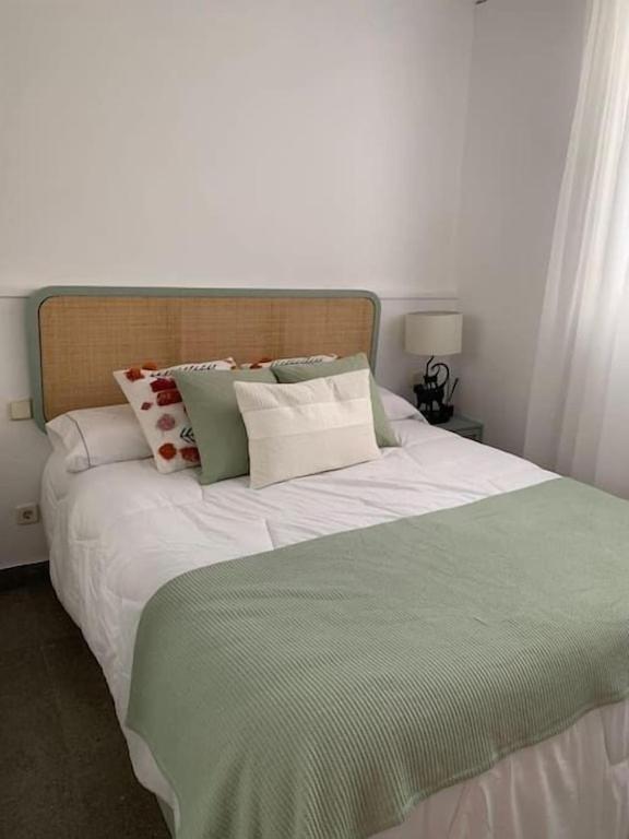 Postel nebo postele na pokoji v ubytování Coqueto apartamento en Chamberí EGU