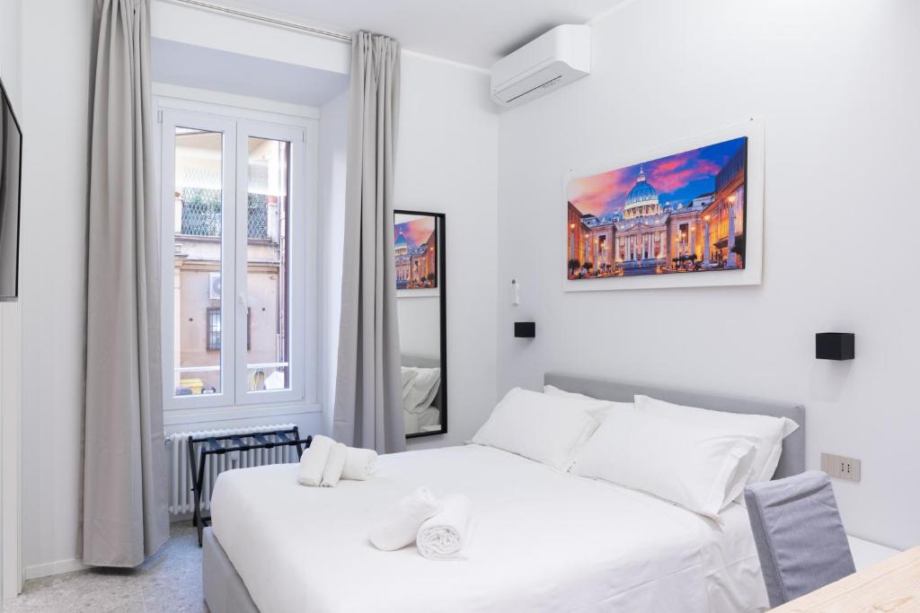 Ліжко або ліжка в номері White Home Suite and Rooms