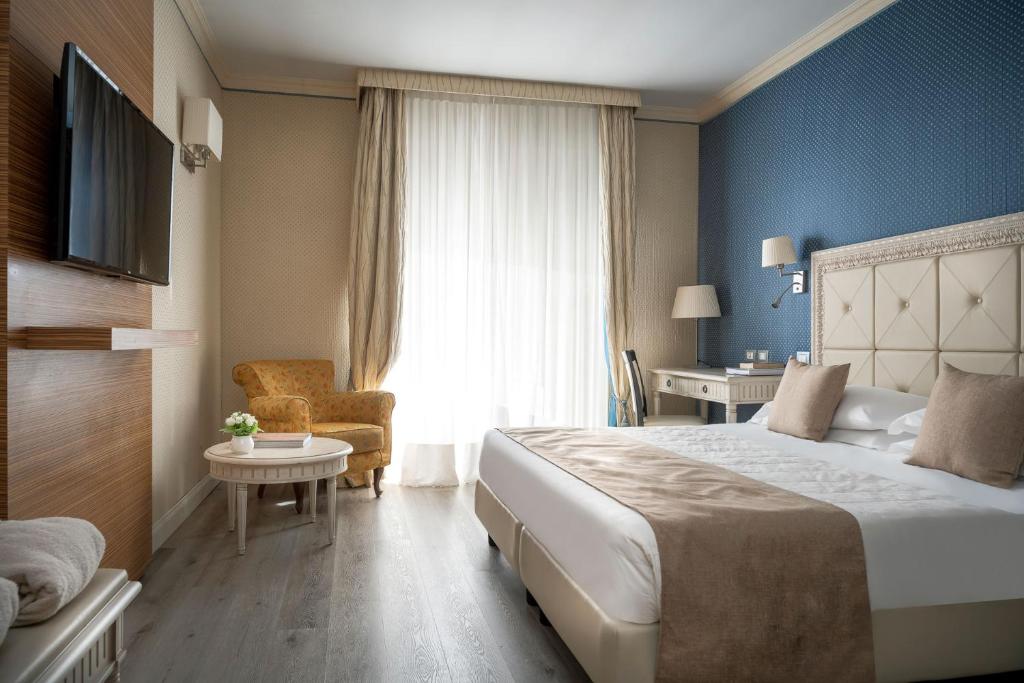Postel nebo postele na pokoji v ubytování Grand Hotel Terme & SPA - Chianciano