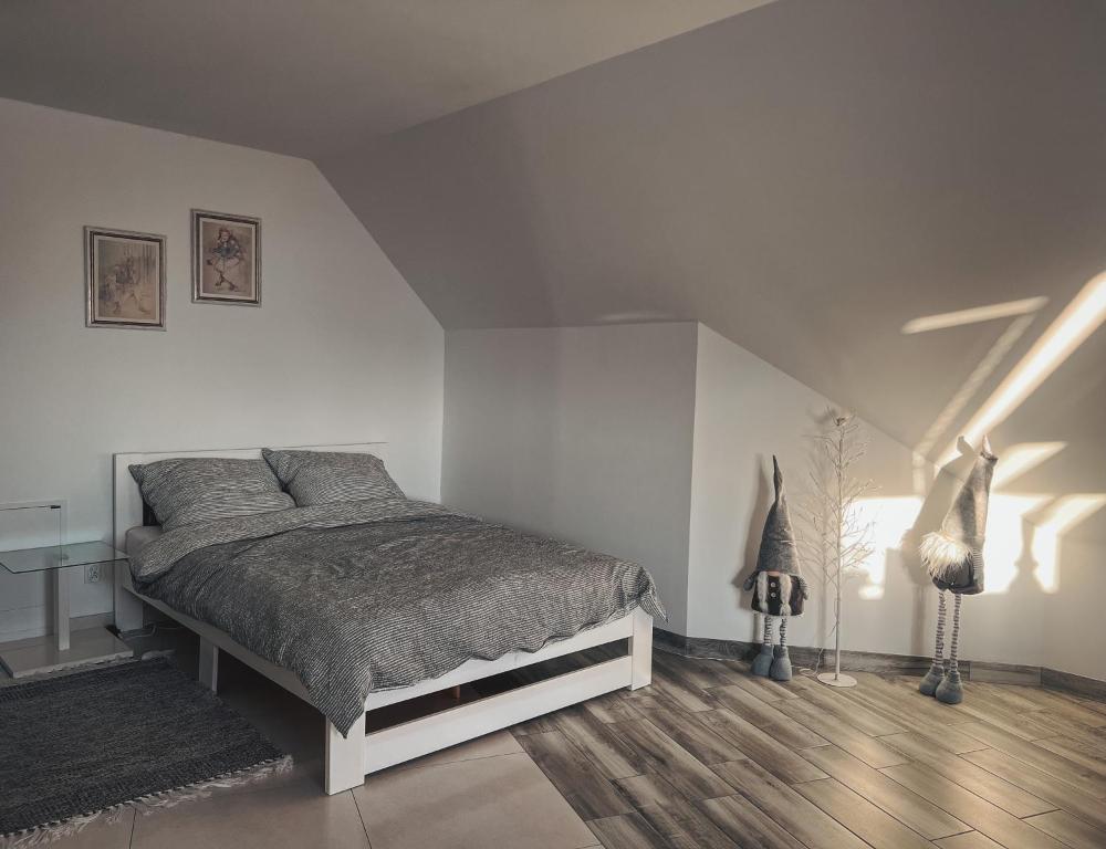 Posteľ alebo postele v izbe v ubytovaní Przytulny apartamentt