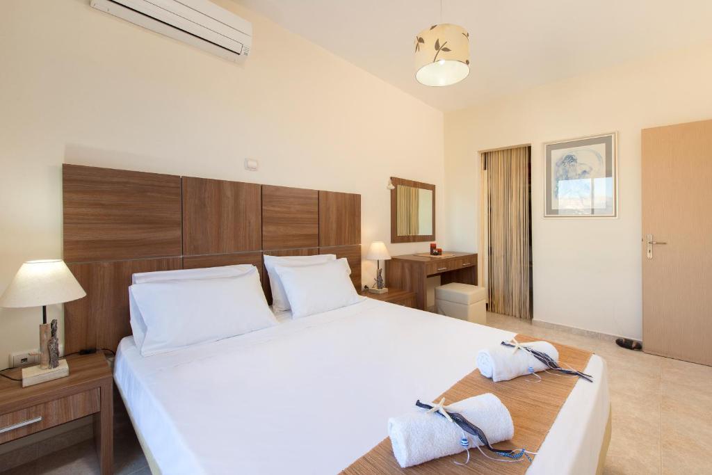 Postel nebo postele na pokoji v ubytování Renata's Villas