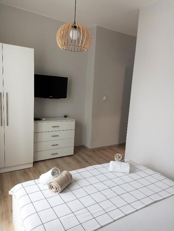 A bed or beds in a room at Apartment SEA HOLIDAYS