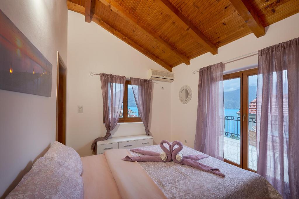 Postel nebo postele na pokoji v ubytování Apartman KATI
