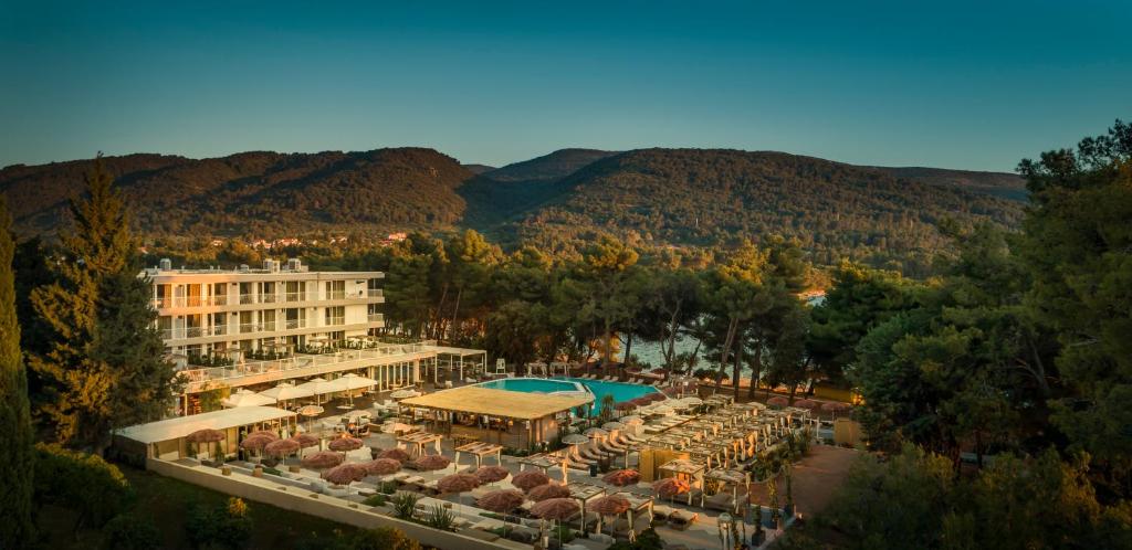 een luchtzicht op een hotel met een resort bij PLACES Hvar Hotel by Valamar in Stari Grad