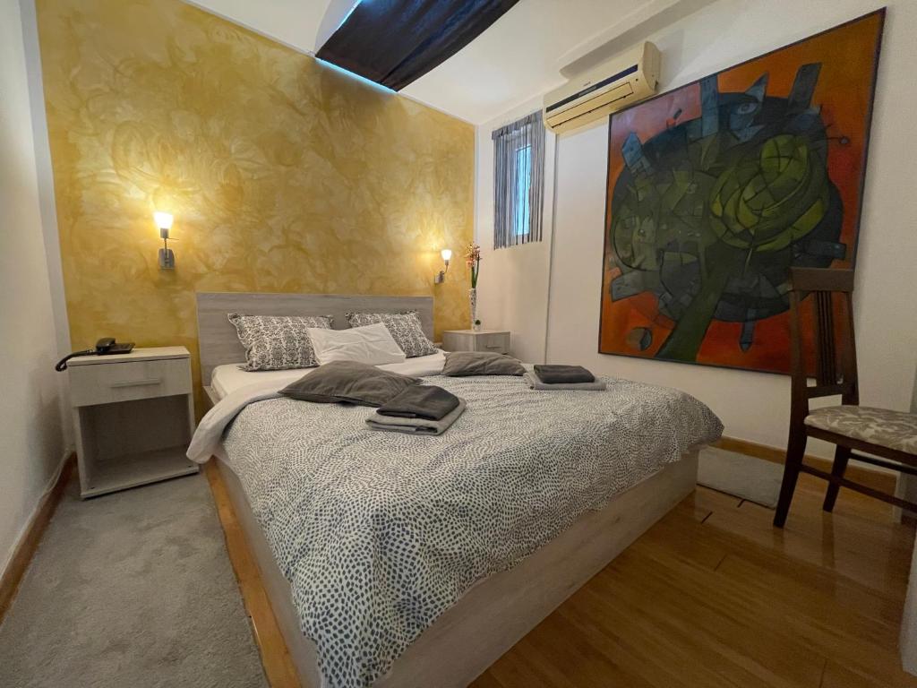 Letto o letti in una camera di TEPIĆ Garni Hotel