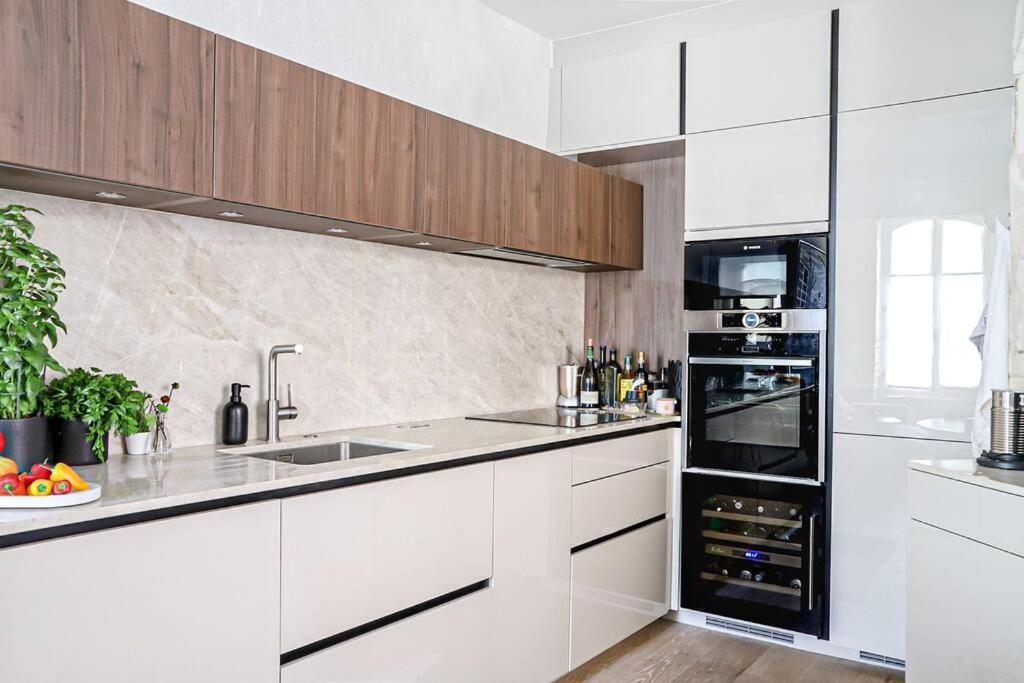 Kuchyňa alebo kuchynka v ubytovaní Appartement 26 Arles centre