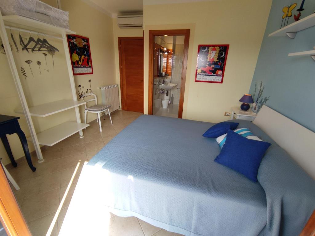 A bed or beds in a room at Il Giardino delle Zagare