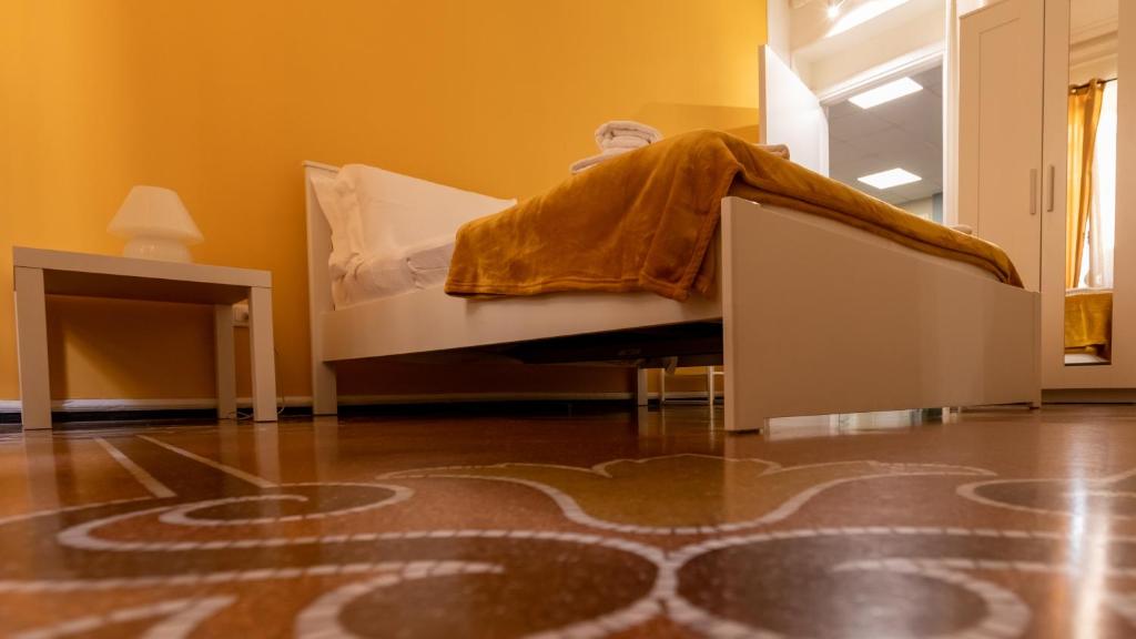 Postel nebo postele na pokoji v ubytování Granello Suite Central