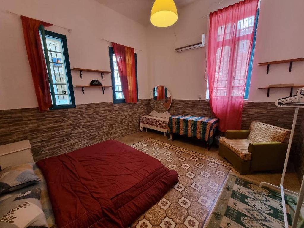 Postel nebo postele na pokoji v ubytování Shams House