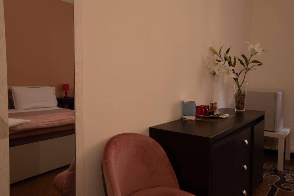 Postel nebo postele na pokoji v ubytování Granello Suite Central