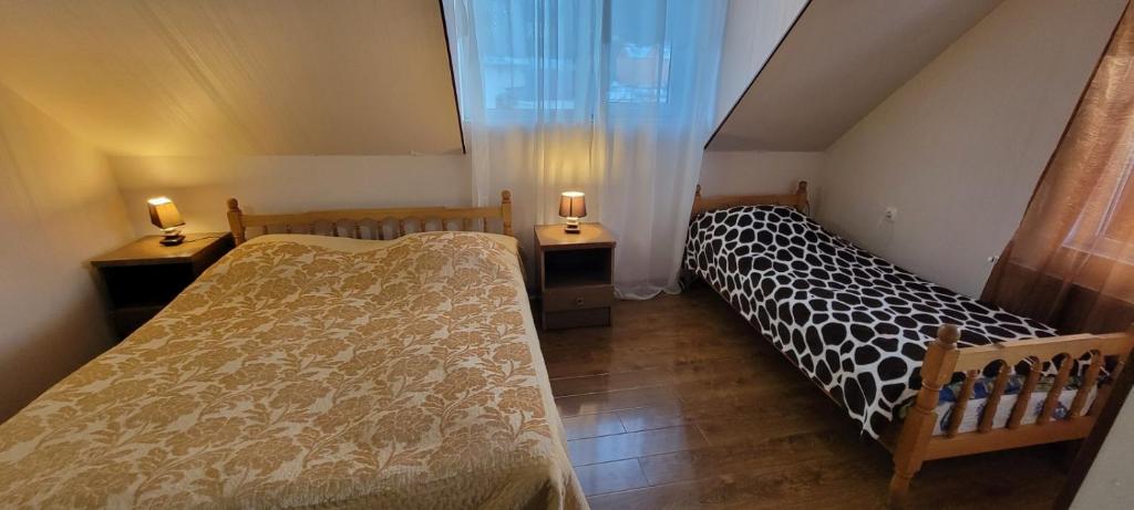 Postel nebo postele na pokoji v ubytování Edemi