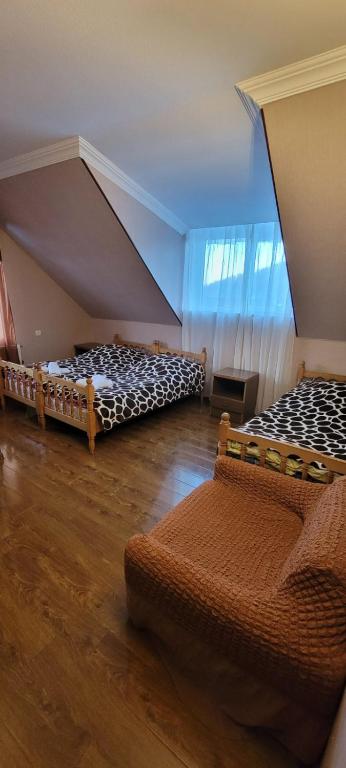 Postel nebo postele na pokoji v ubytování Edemi