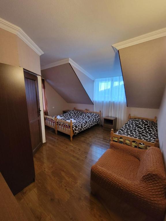Postel nebo postele na pokoji v ubytování Edemi
