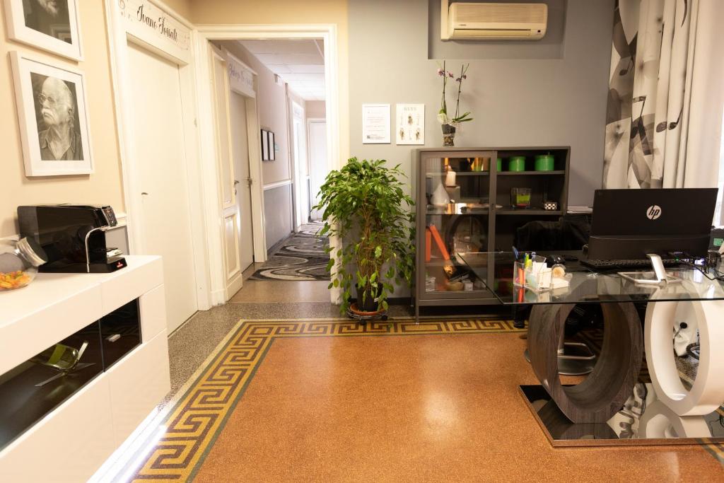 Kuchyň nebo kuchyňský kout v ubytování Granello Suite Central