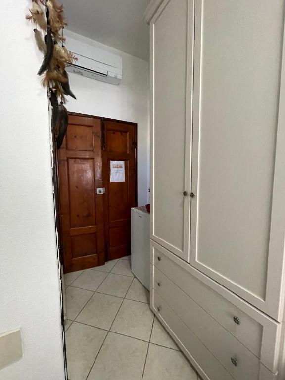 Fotografie z fotogalerie ubytování Giuly's Room v destinaci Porto Santo Stefano