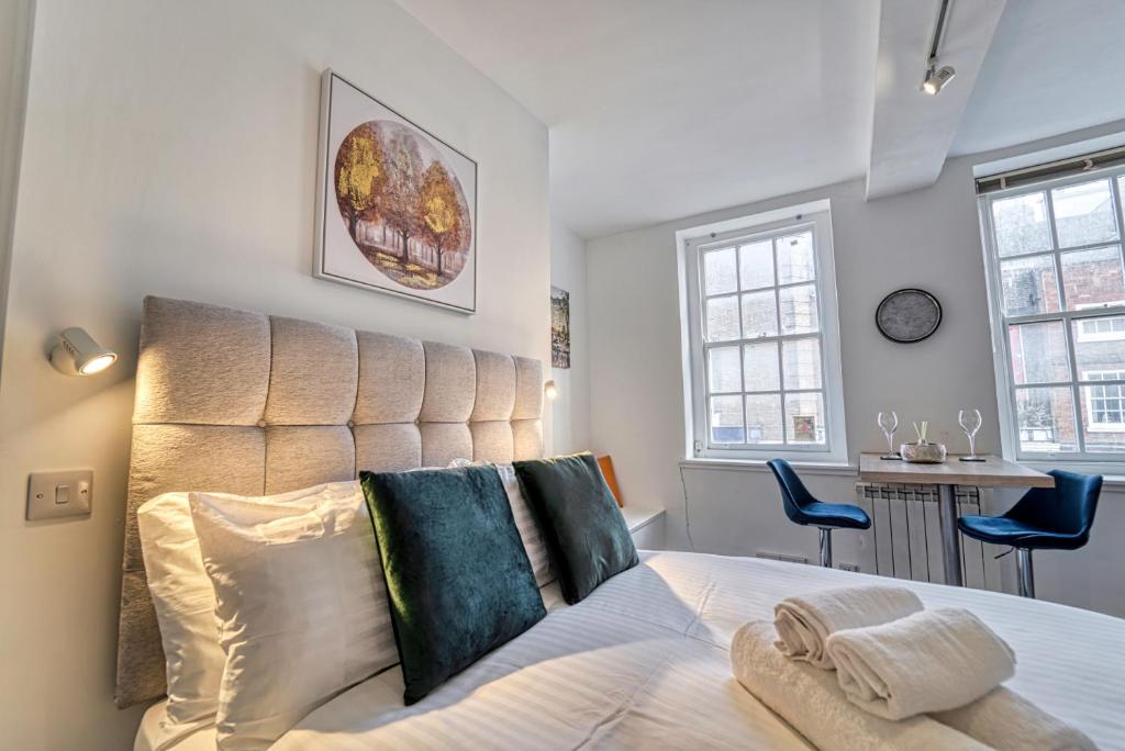 Posteľ alebo postele v izbe v ubytovaní Guest Homes - Hills Apartments