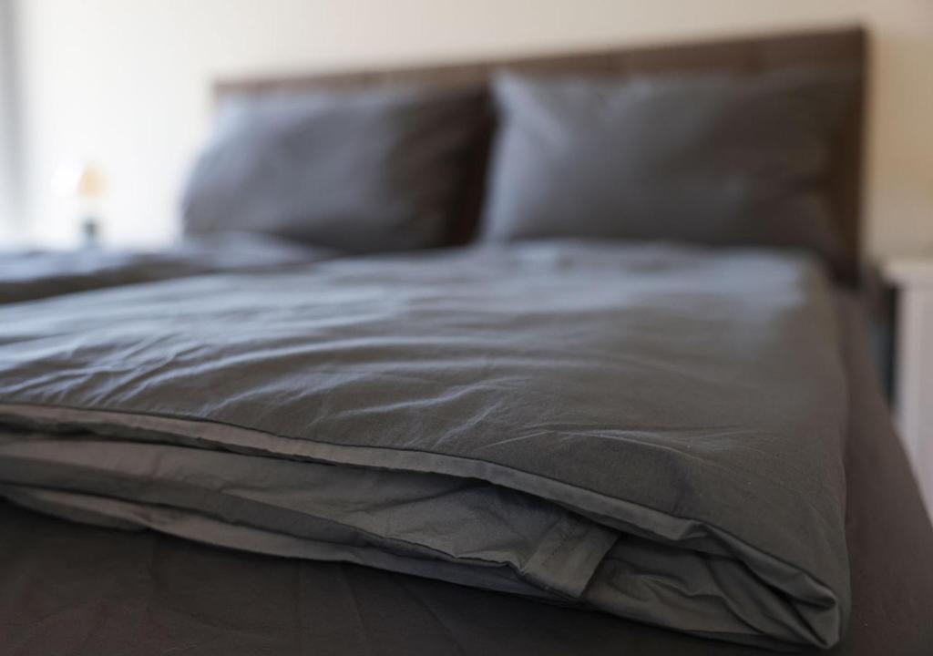 Postel nebo postele na pokoji v ubytování Residenz Kirchberg