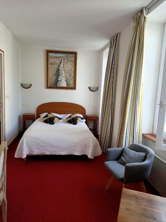 Postel nebo postele na pokoji v ubytování Hotel Saint Amant