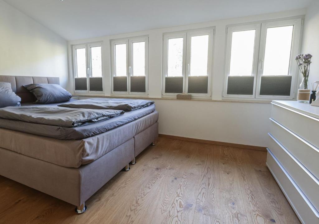 Postel nebo postele na pokoji v ubytování Residenz Kirchberg