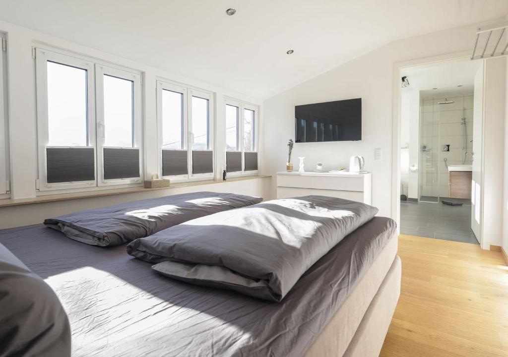Postel nebo postele na pokoji v ubytování Residenz Kirchberg