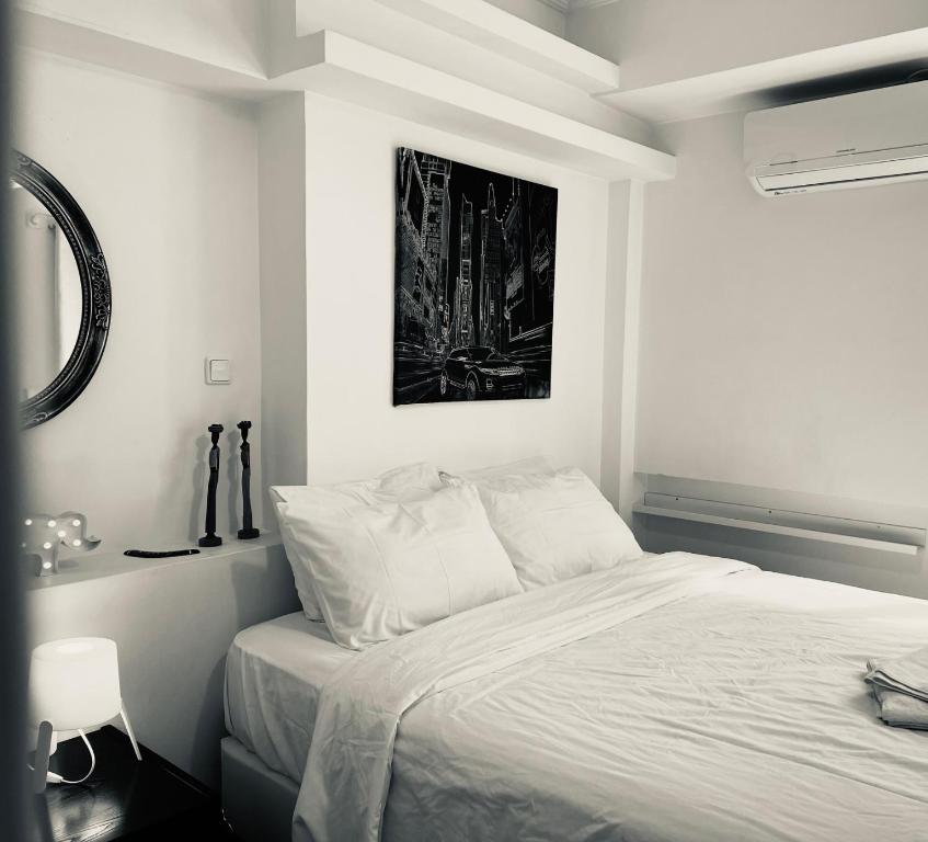 Posteľ alebo postele v izbe v ubytovaní Elenis Athens Apartment