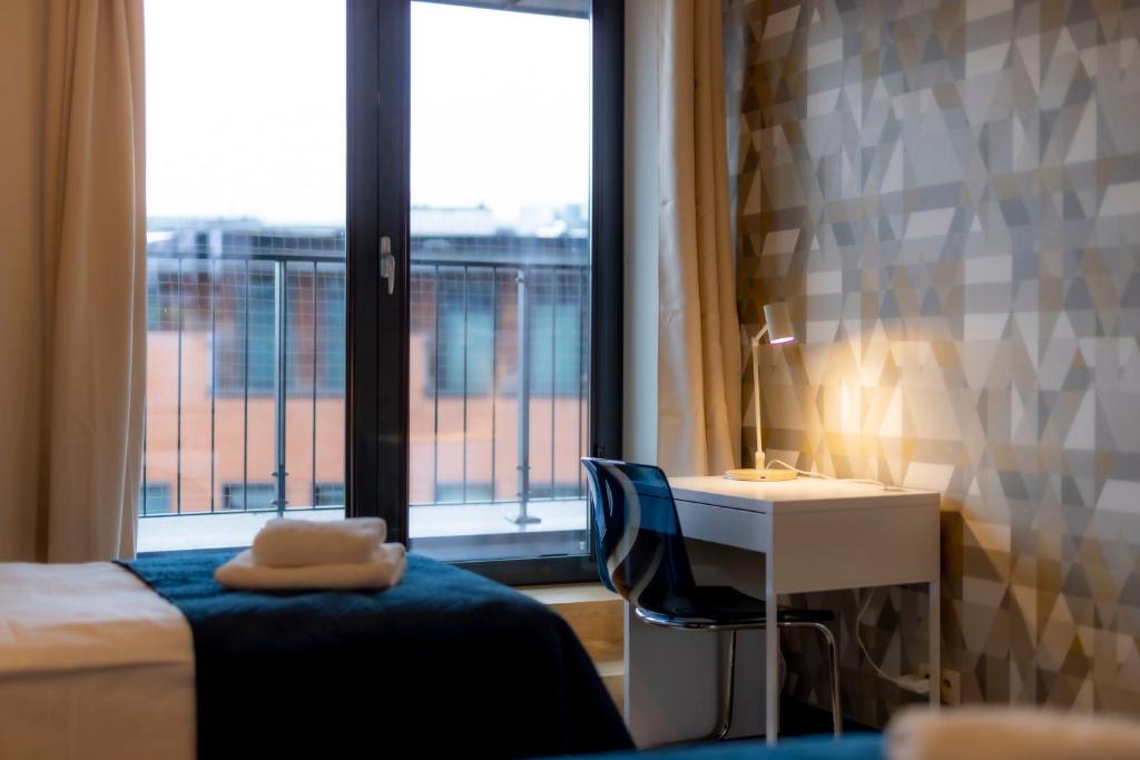 Posteľ alebo postele v izbe v ubytovaní Penthouse Cracow