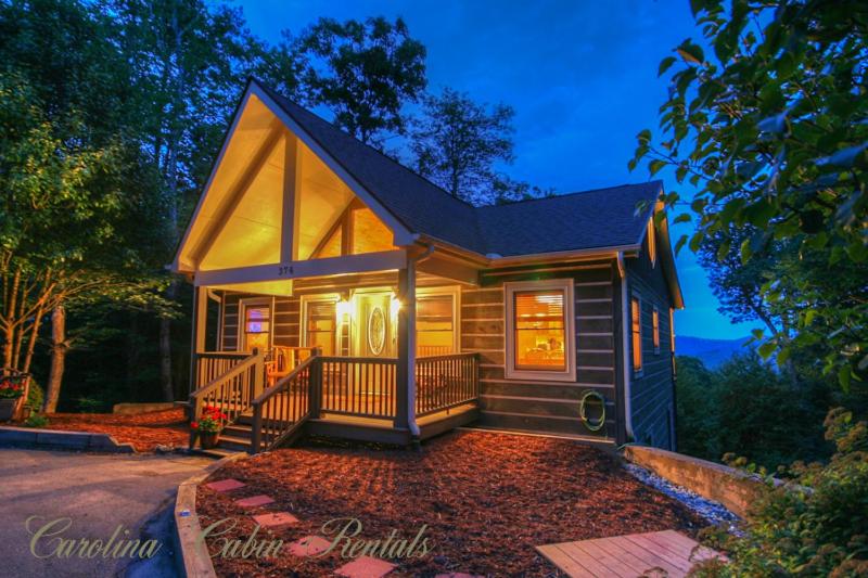 a small house with a front porch and a staircase at Appalachian Breeze in Blowing Rock