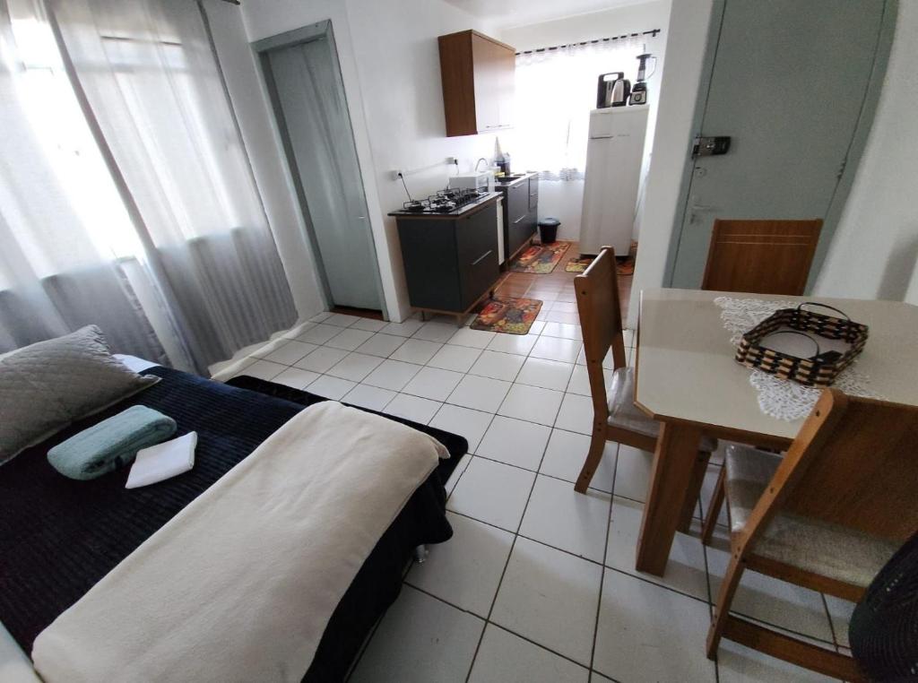Kuchyň nebo kuchyňský kout v ubytování Apartamento PRATICO