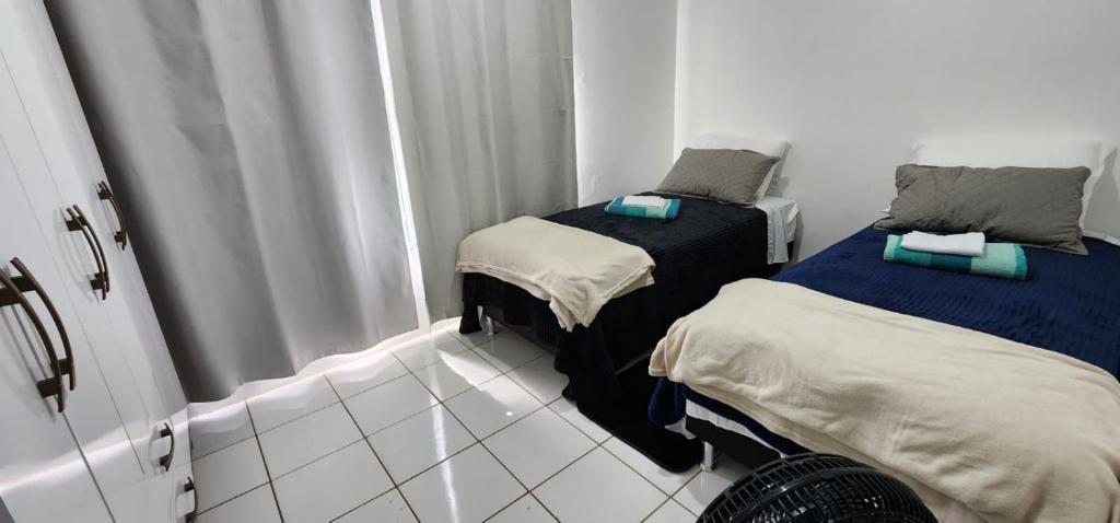 Postel nebo postele na pokoji v ubytování Apartamento PRATICO