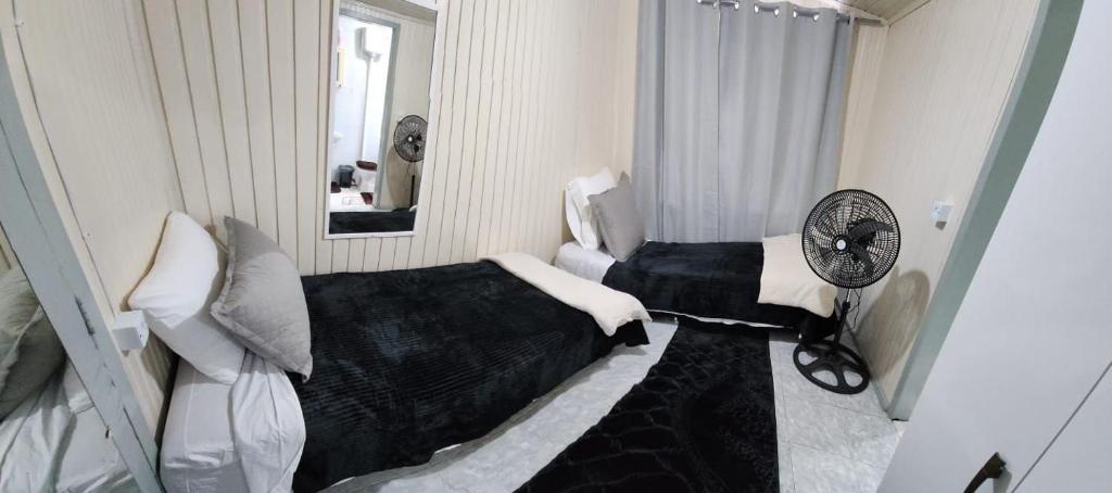 Postel nebo postele na pokoji v ubytování Apartamento PRATICO