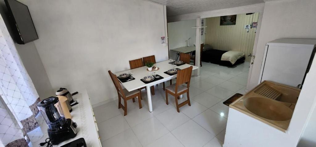 Kuchyň nebo kuchyňský kout v ubytování Apartamento PRATICO