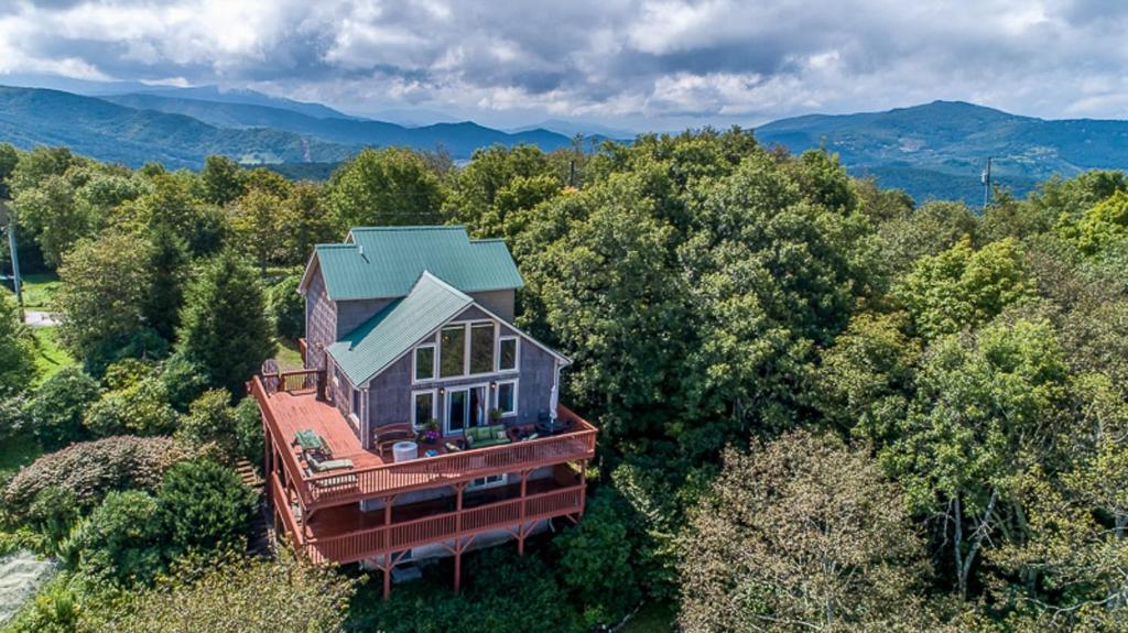 an aerial view of a house in the woods at Four Diamond Escape in Seven Devils