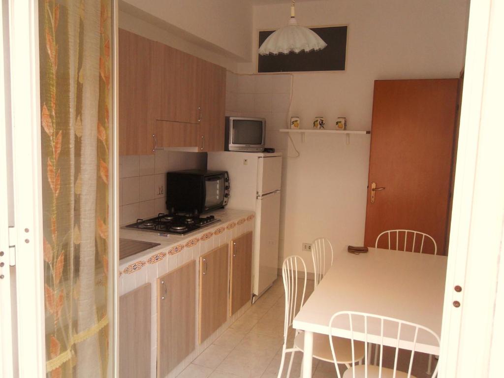 A kitchen or kitchenette at Case Vacanza Lampedusa