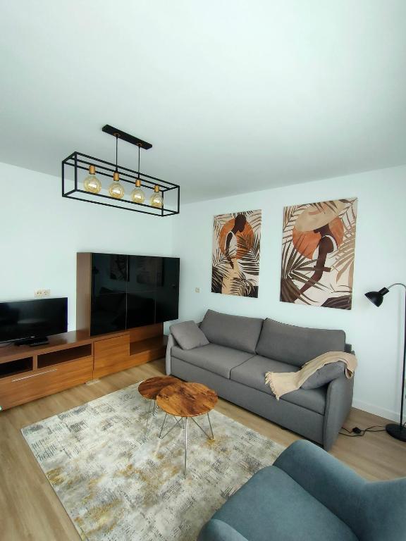 A seating area at Second Home Arzúa apartamentos