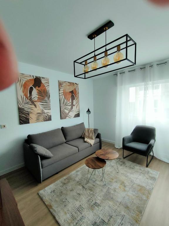 A seating area at Second Home Arzúa apartamentos