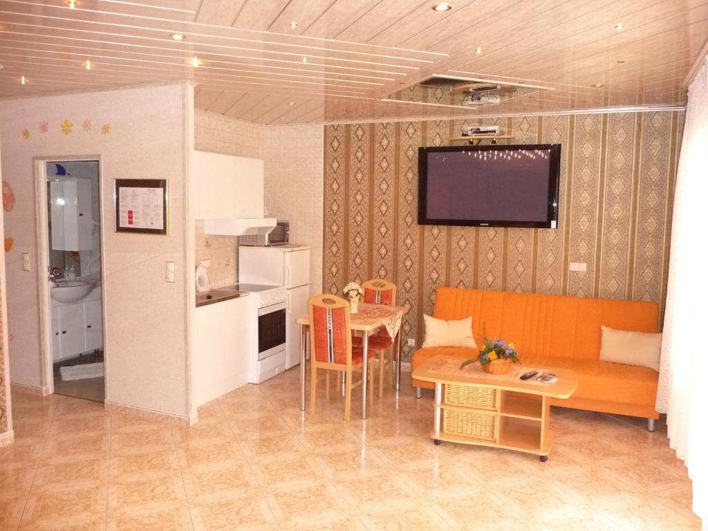 Kuchyň nebo kuchyňský kout v ubytování Central Hotel