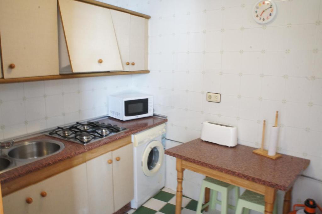 Kuchyň nebo kuchyňský kout v ubytování Apartamento Casa de la Parra
