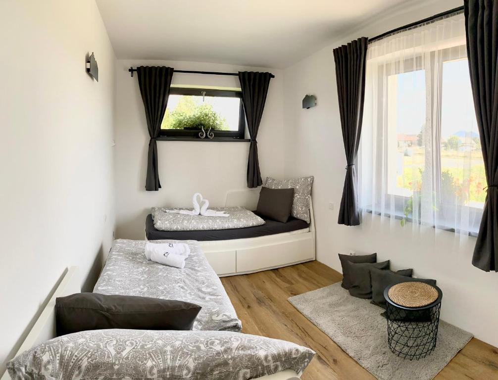 Postel nebo postele na pokoji v ubytování Apartmány DOME