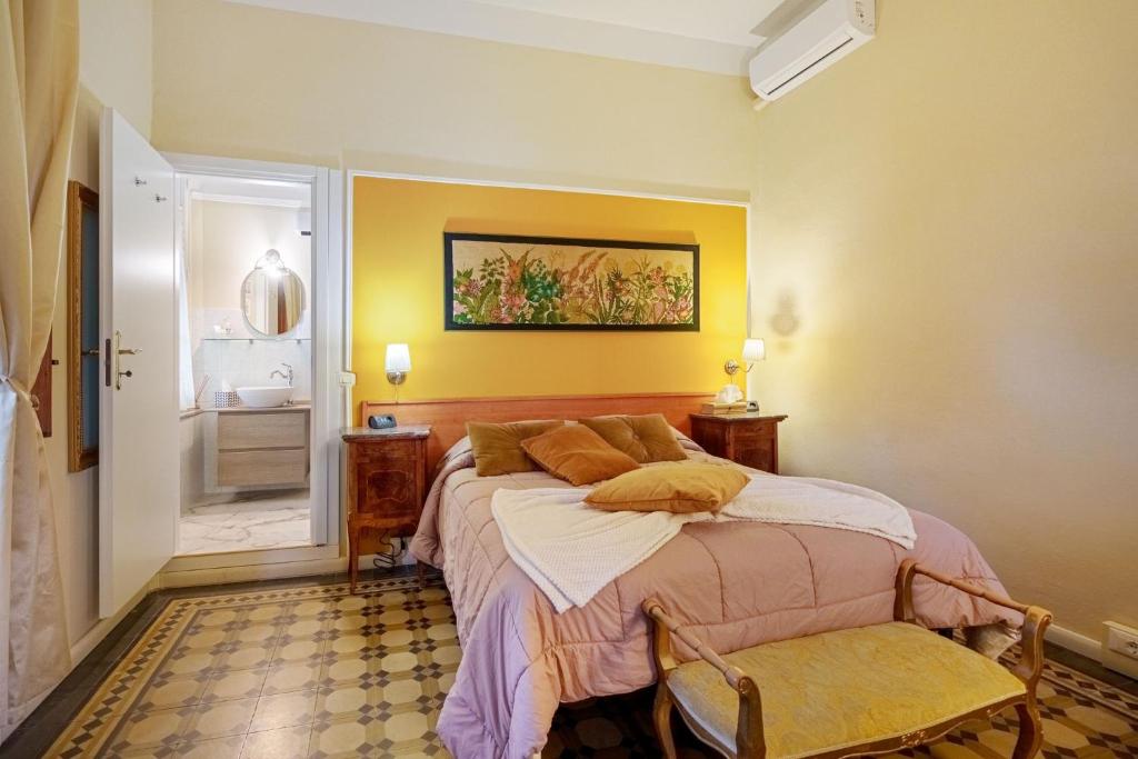 Postel nebo postele na pokoji v ubytování Villa San Donato B&B