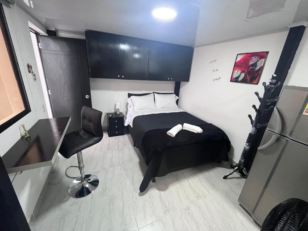Postel nebo postele na pokoji v ubytování Edificio SantaMarta Medellín