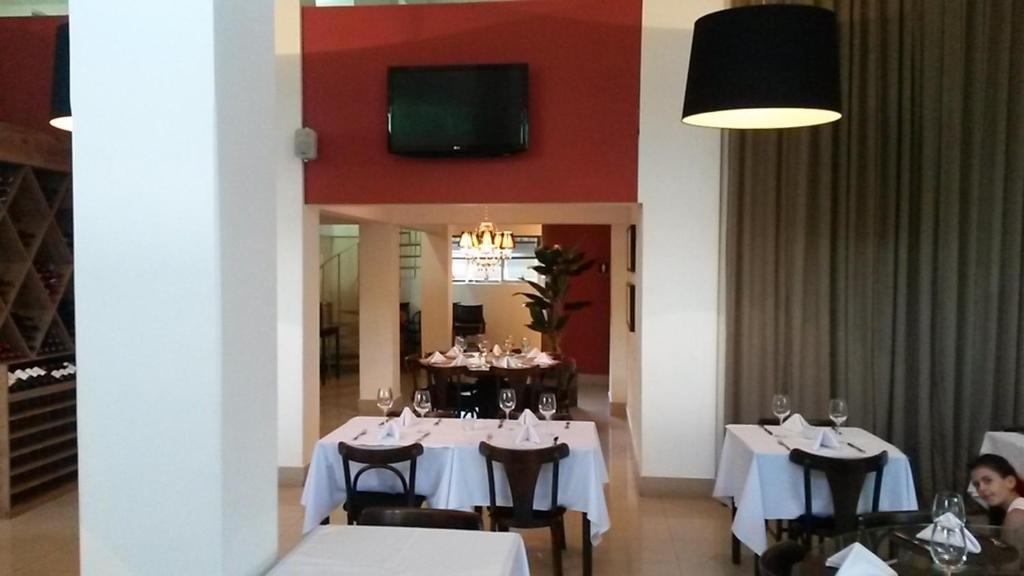 TV a/nebo společenská místnost v ubytování Itajubá Flat Hotel