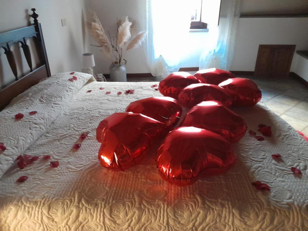 Łóżko lub łóżka w pokoju w obiekcie A casa di Grazia