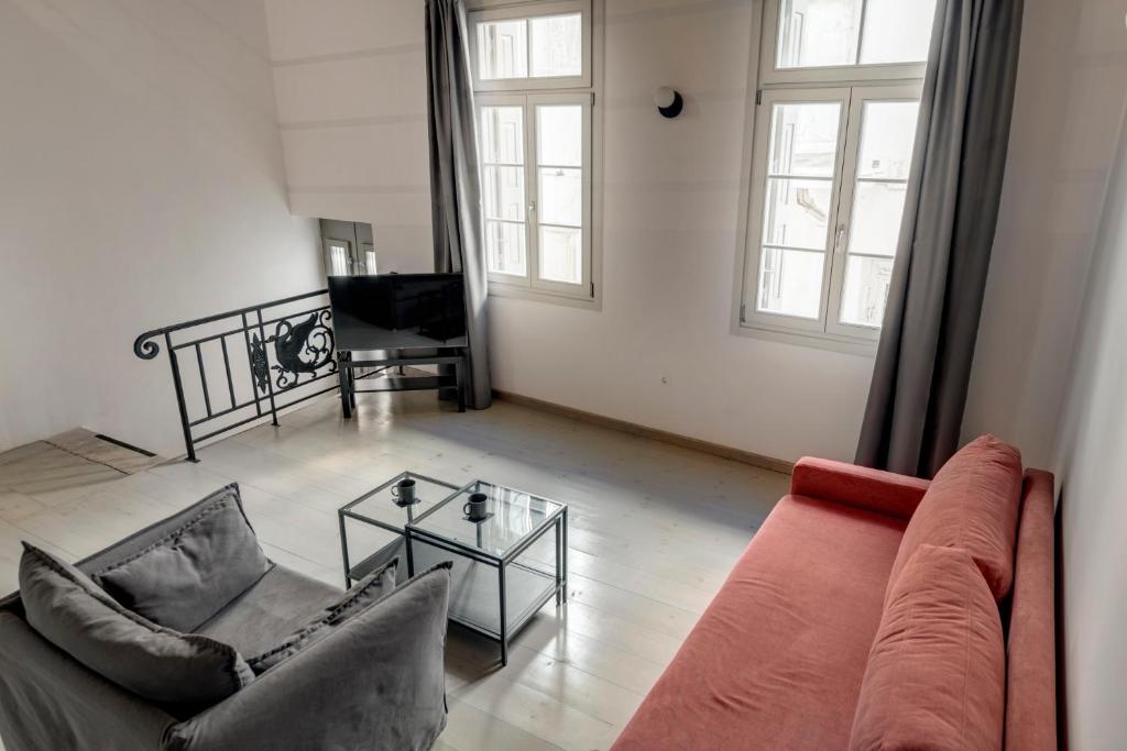Zona de estar de The Ten Syros