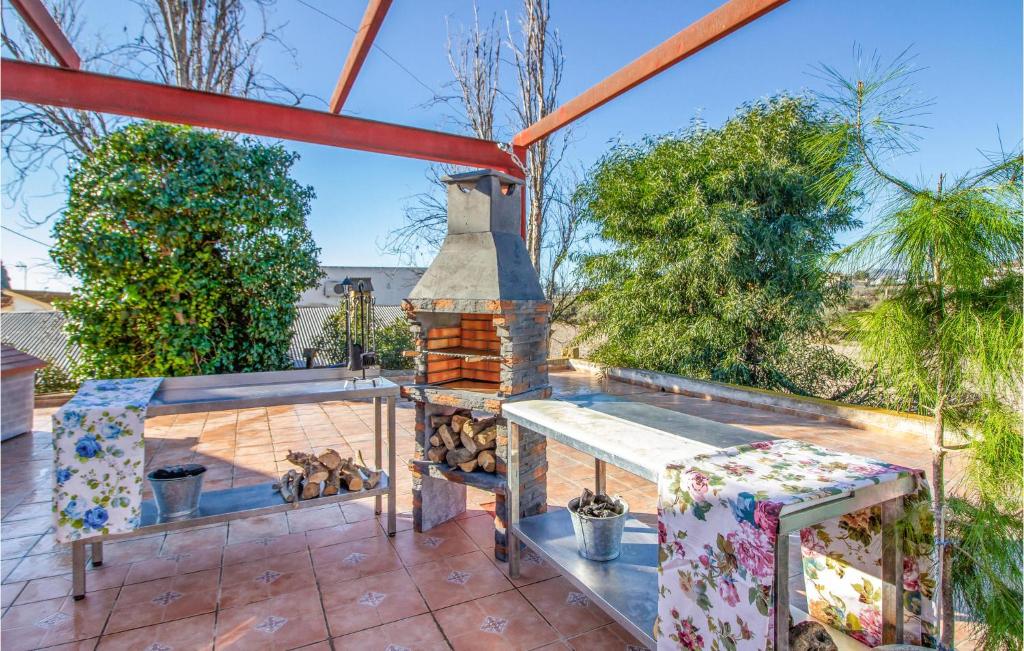 A balcony or terrace at 4 Bedroom Beautiful Home In Lorca