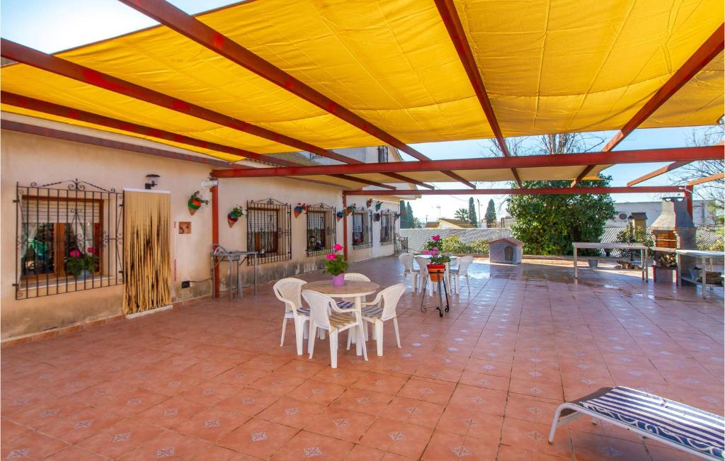 A balcony or terrace at 4 Bedroom Beautiful Home In Lorca